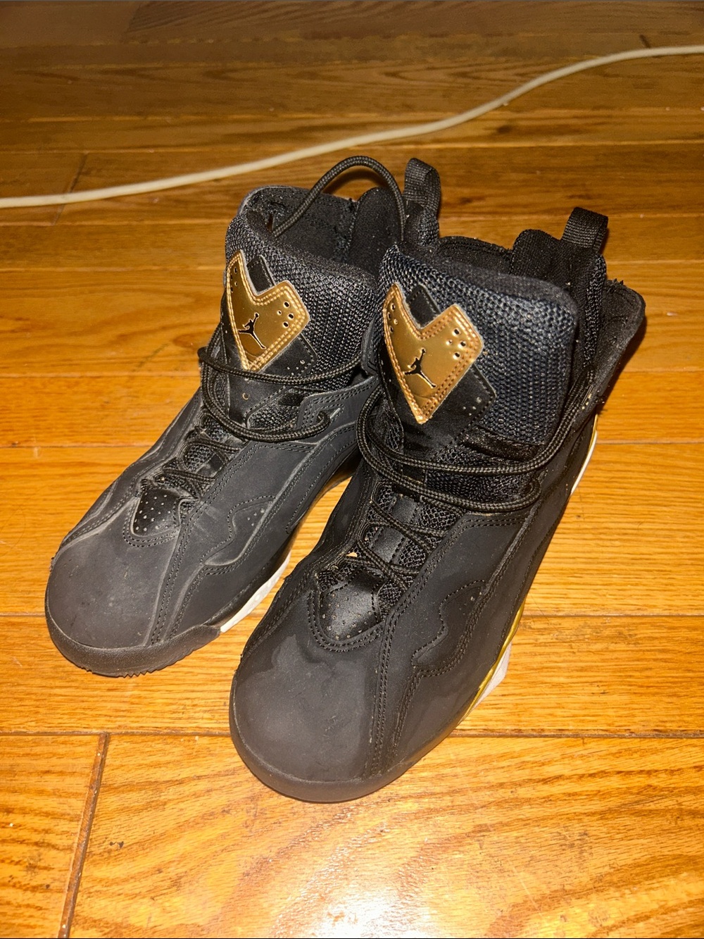 Jordan Kids Black and Gold High-Top Sneakers